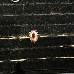 Elegant Gold and Red Gemstone Ring